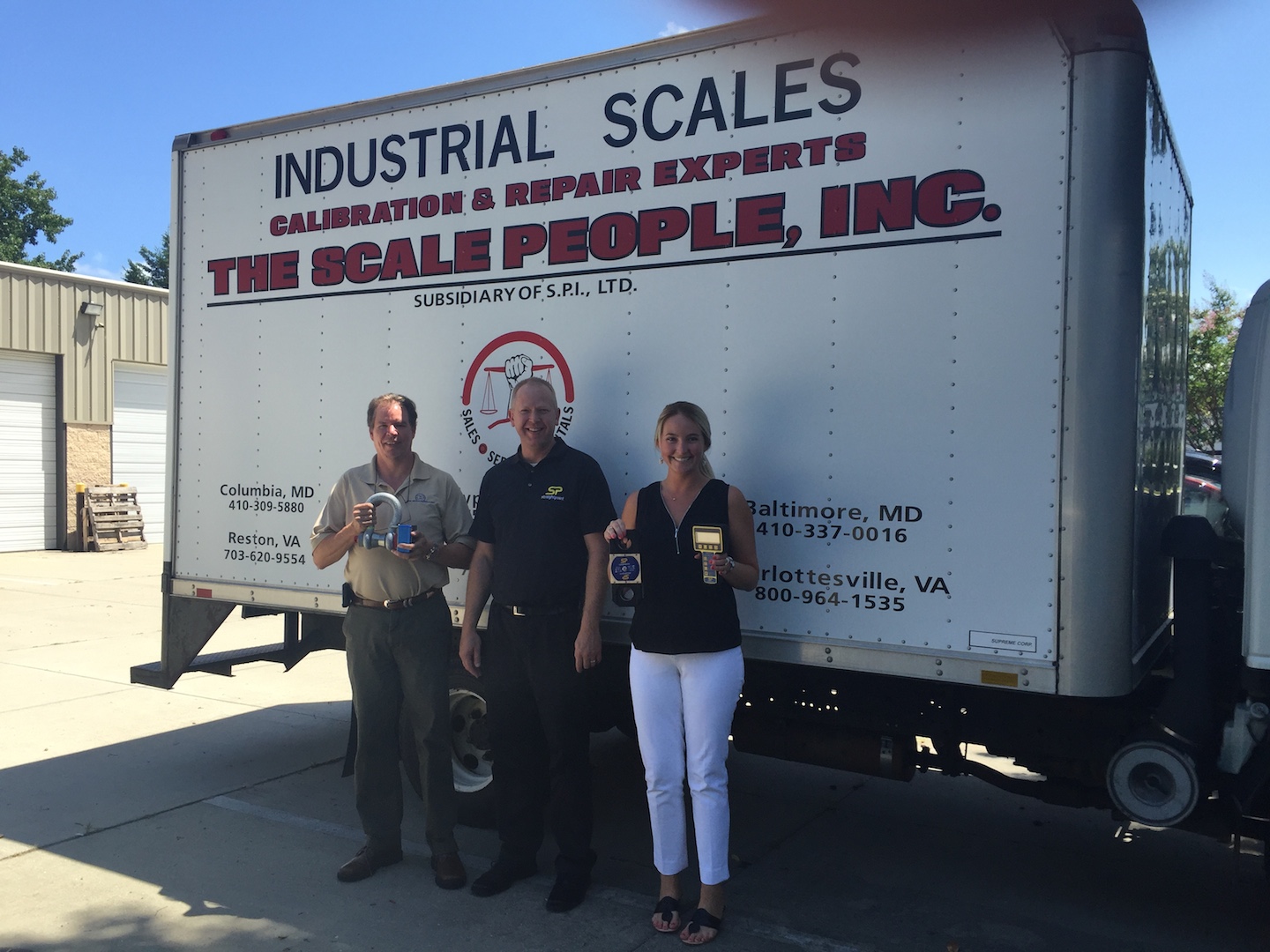 Straightpoint’s Wayne Wille with Craig Buck, president, and Virginia Thayer Smith, sales, The Scale People Inc.